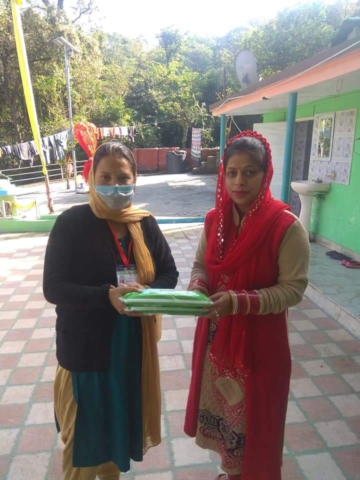 FREE SANITARY PAD DISTRIBUTION BY DISHA WORKERS